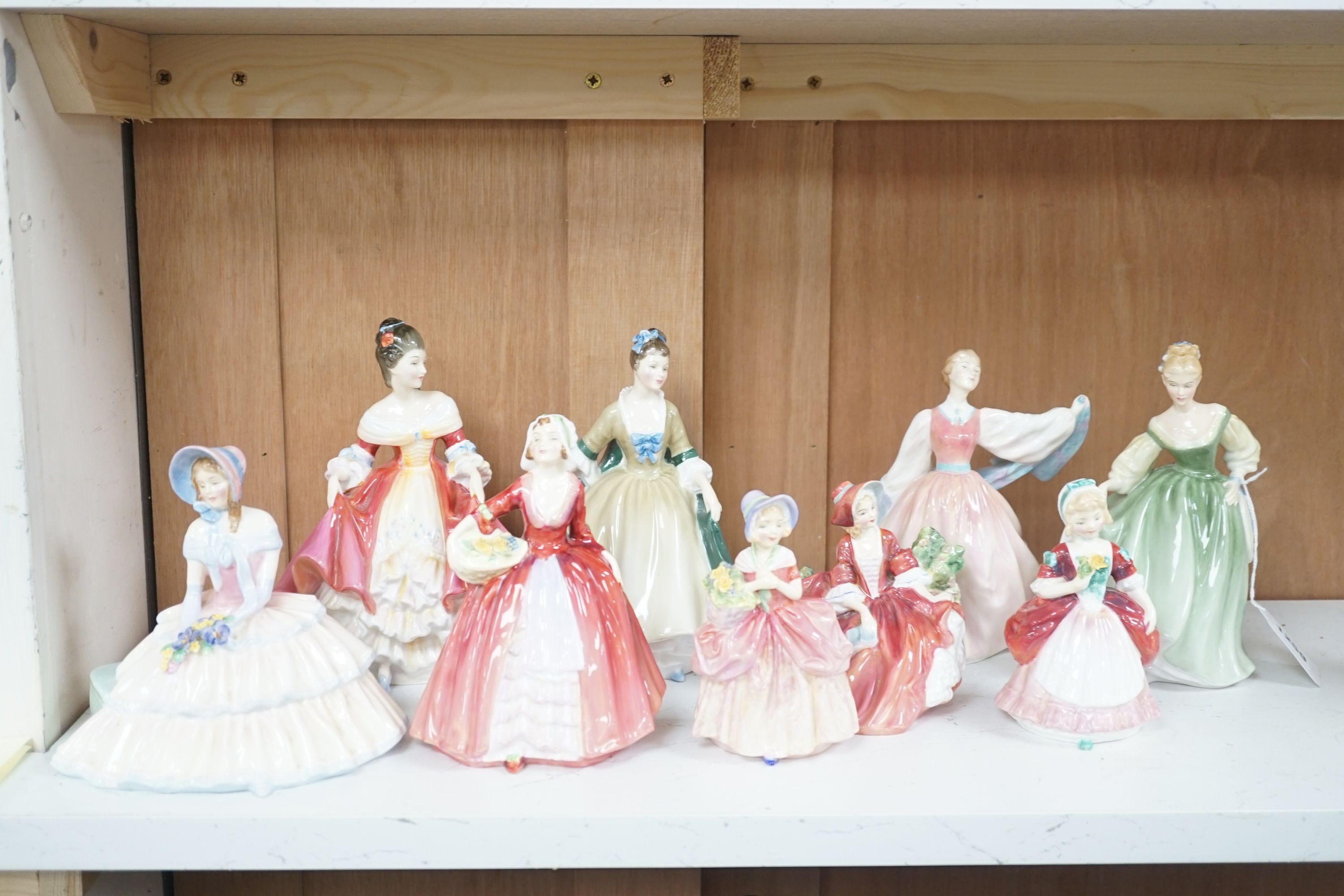 6 Royal Doulton figurines and 3 smaller figurines, Fair Lady HN2193, Gay Morning HN2135, Cissie HN1809, Valerie HN2107, Elegance HN2264, Lydia HN1908, Janet HN1537, Day Dreams HN1731 and Southern Bell HN2229